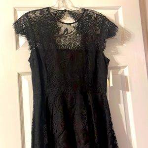 Black lace mini dress with cap sleeves